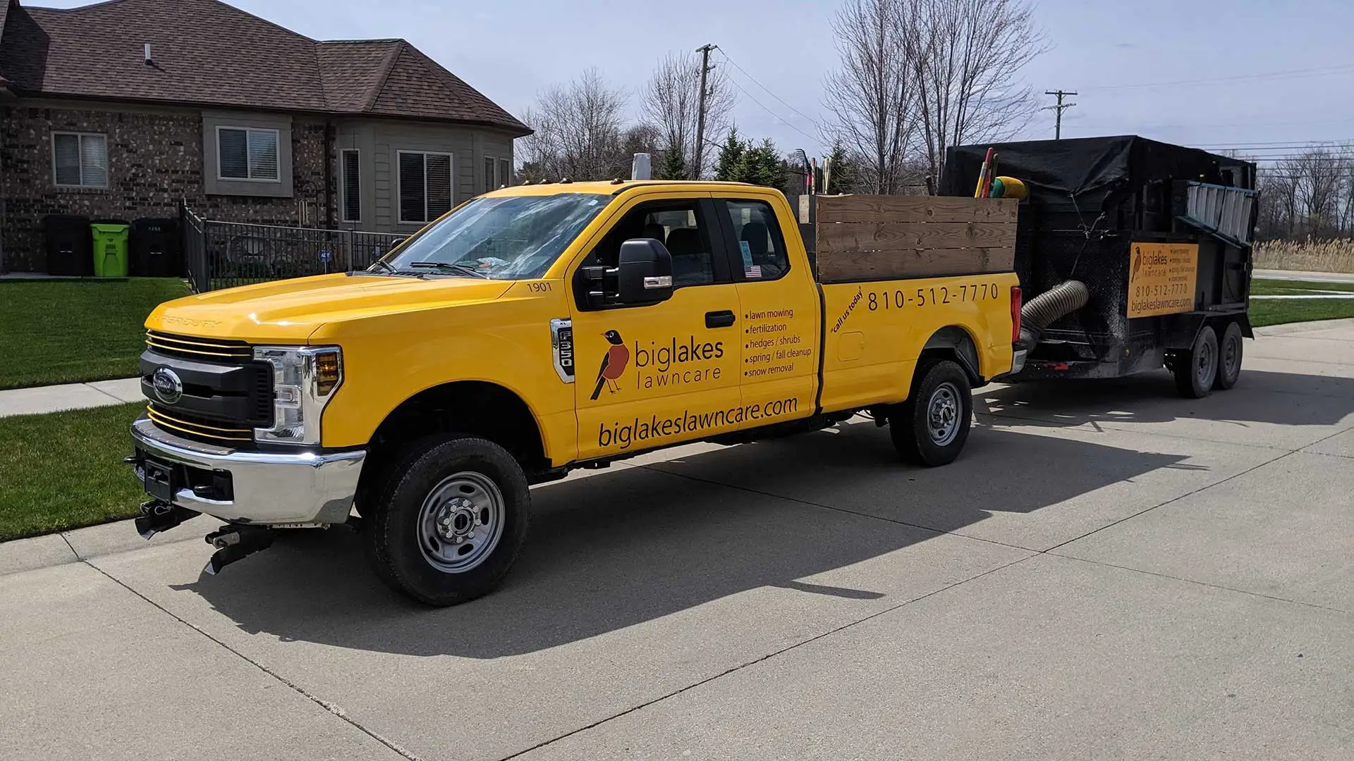 Big Lakes Lawncare work truck arriving to perform lawn care in Clinton Township, MI.