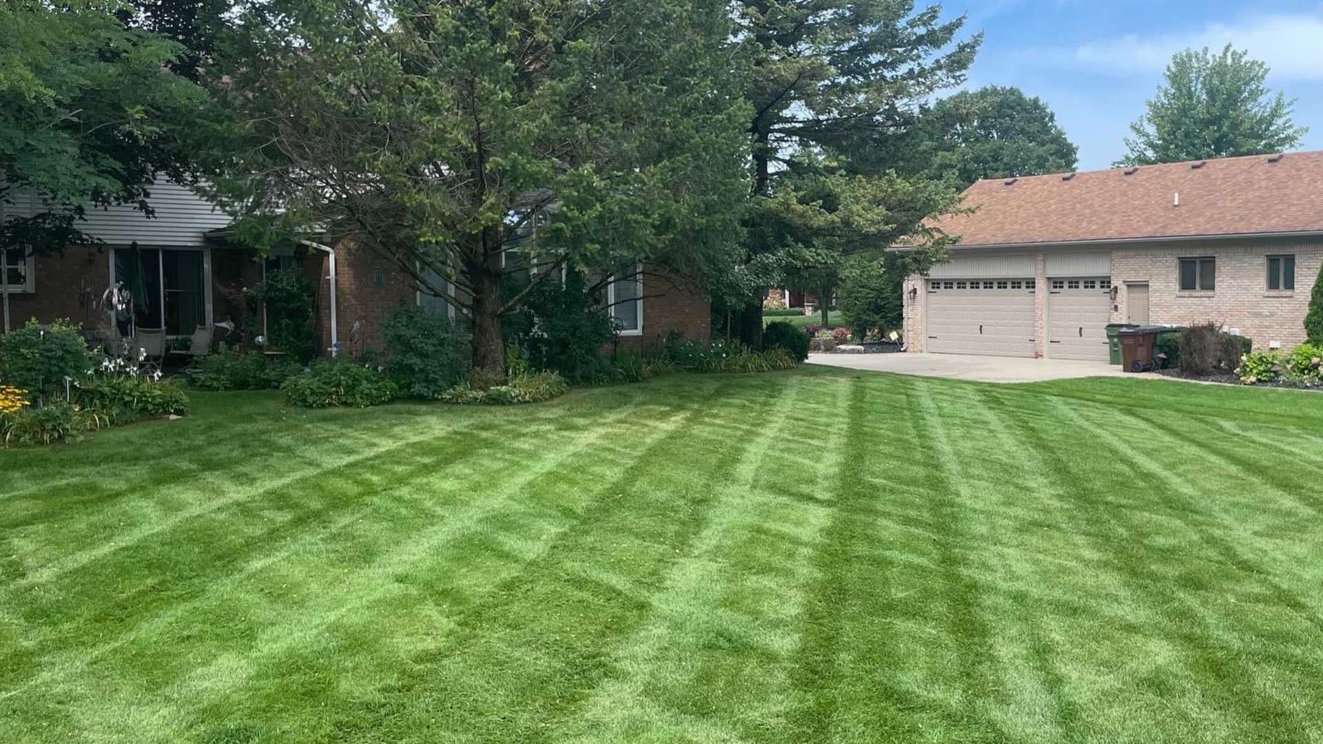 Mowed lawn for clients with patterns added in Mount Clemens,  MI.