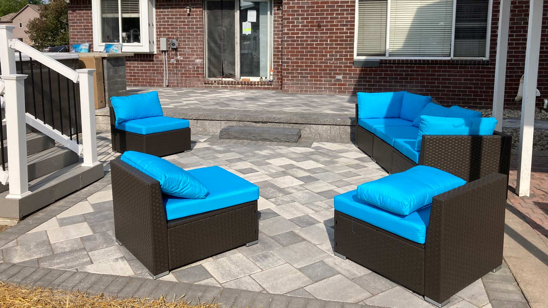 Patio installed with furniture placed in Macomb, MI.