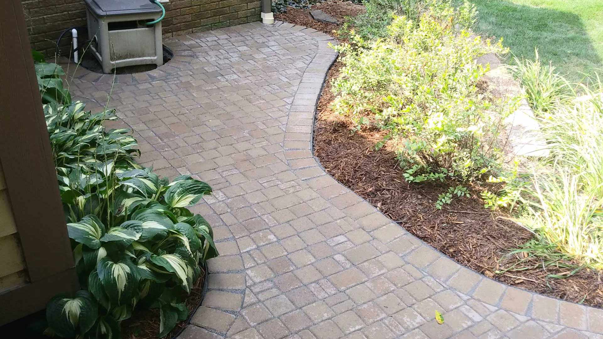 Walkway hardscape feature installed for property in Rochester, MI.