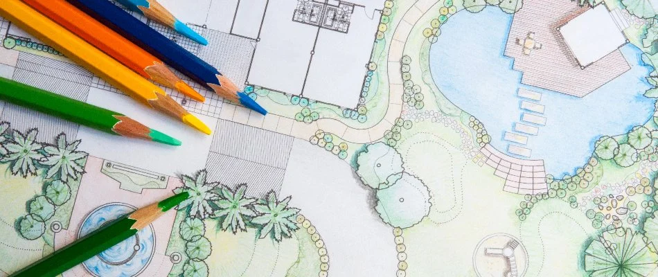 A 2D design rendering of a landscape in Macomb, MI, with colored pencils on top.