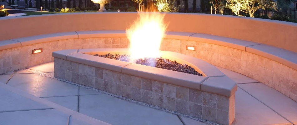Gas fire pit and a seating wall in Macomb, MI.