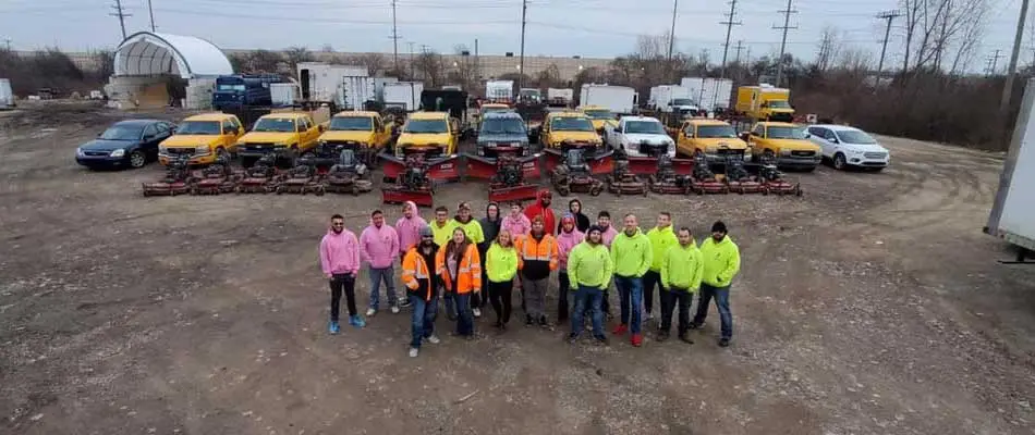 Big Lakes Lawncare company crew, work trucks, and equipment near Macomb, MI.