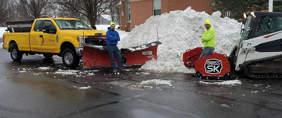 Big Lakes Lawncare snow plowing trucks and crew ready for snow removal in Macomb, MI.