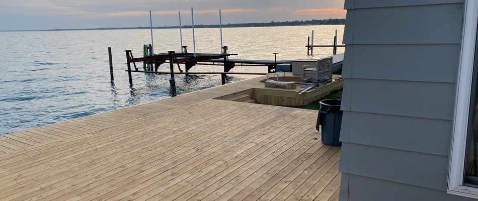 Deck installed beside waterfront in Chesterfield, MI.