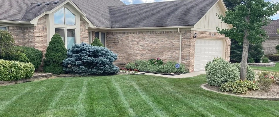 Mowing patterns added to lawn in Troy, MI.