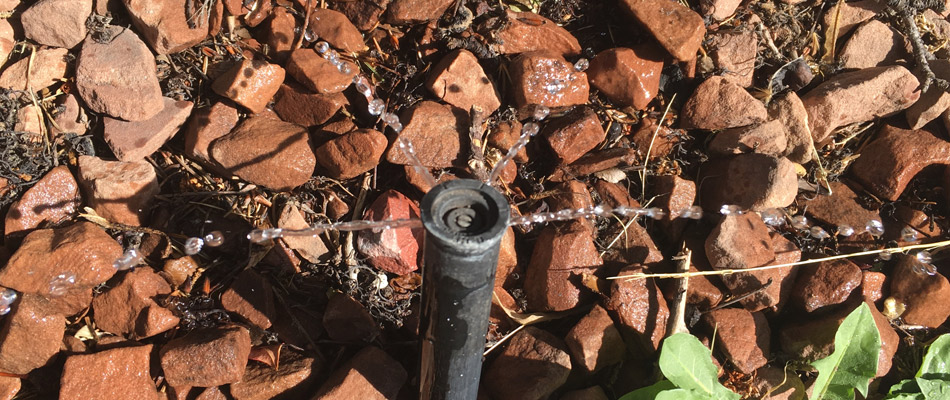 Low pressured, broken irrigation sprinkler head in Chesterfield, MI.