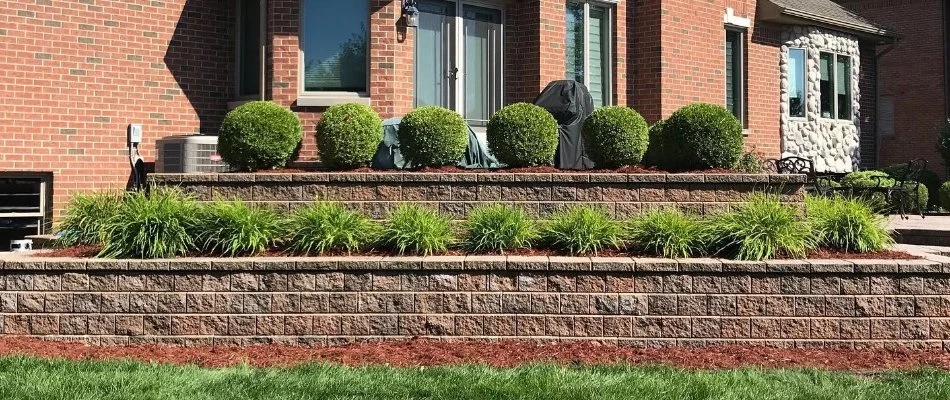 Retaining wall with raised planter bed in Marysville, MI.