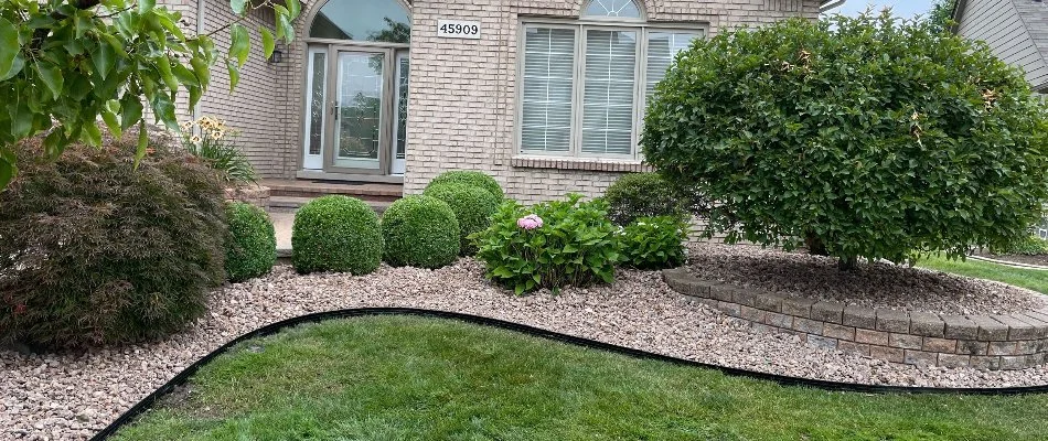 Rock ground cover in a landscape bed in Macomb, MI.